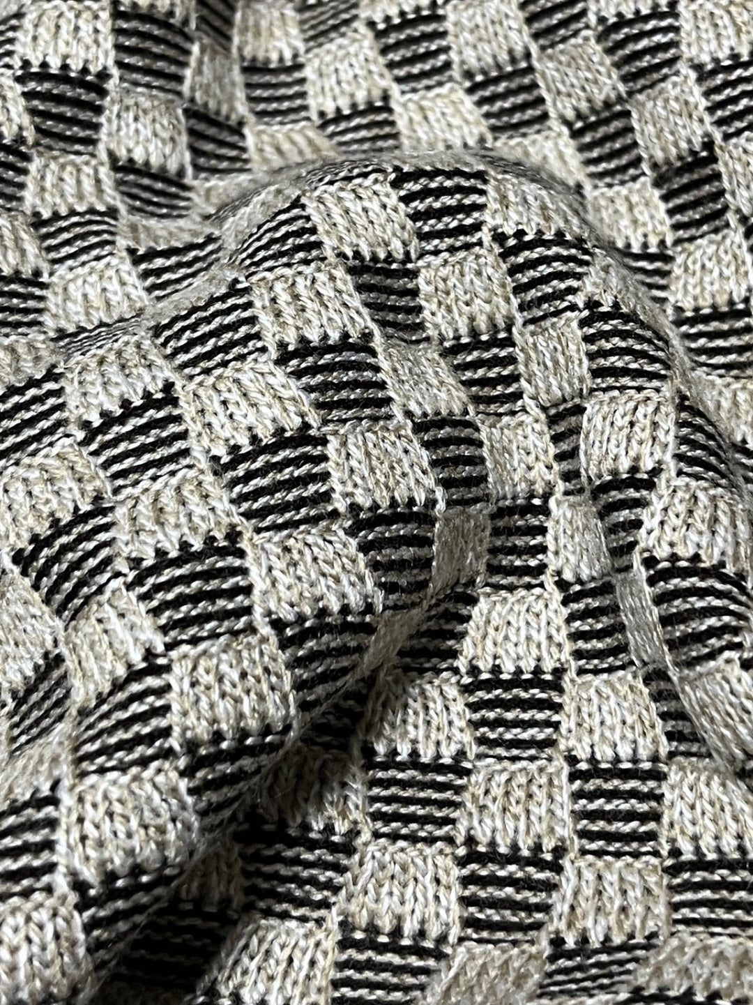 beige × black checkered knit