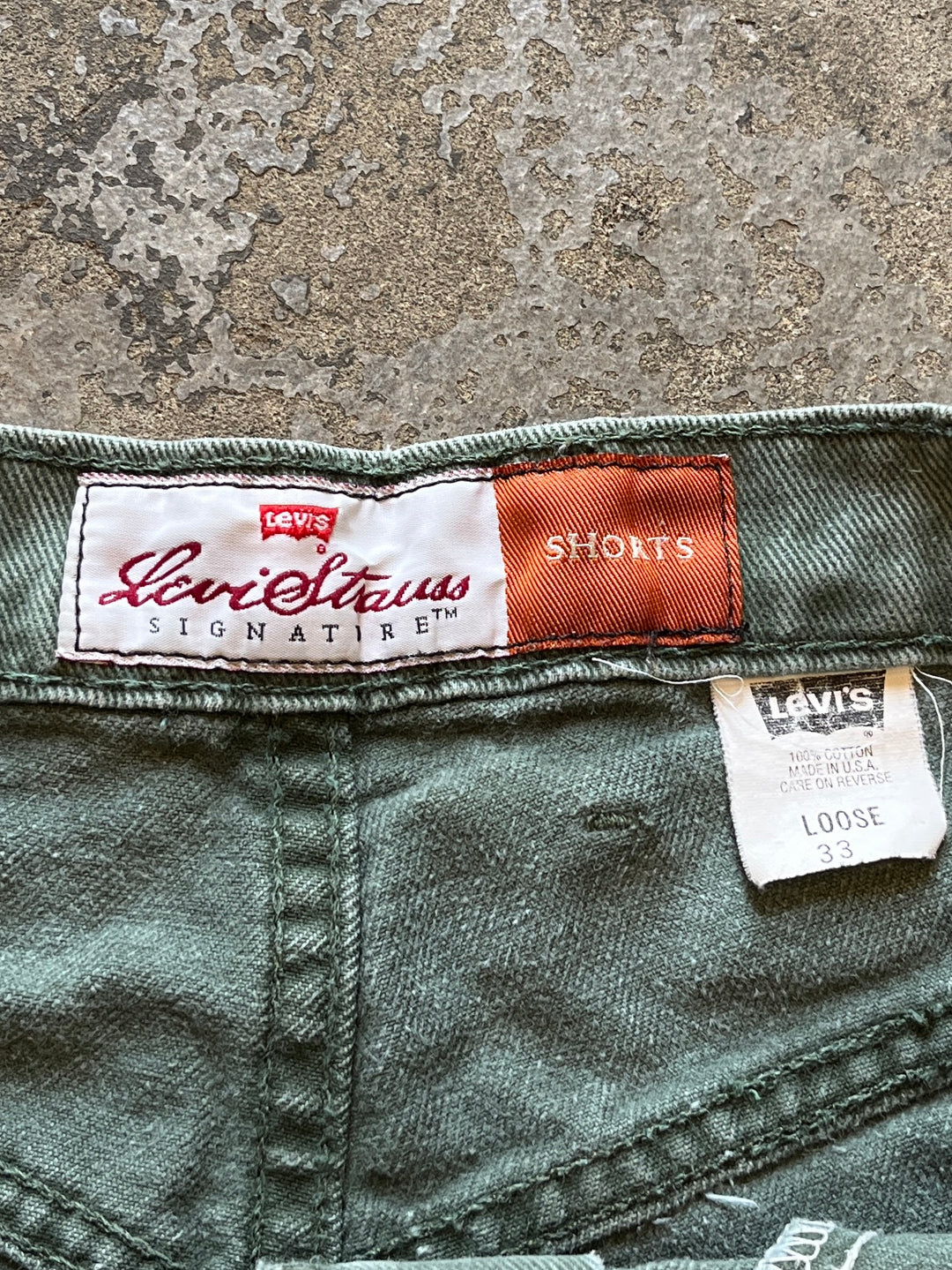 1990s "Levi's Signature" faded olive denim shorts W33