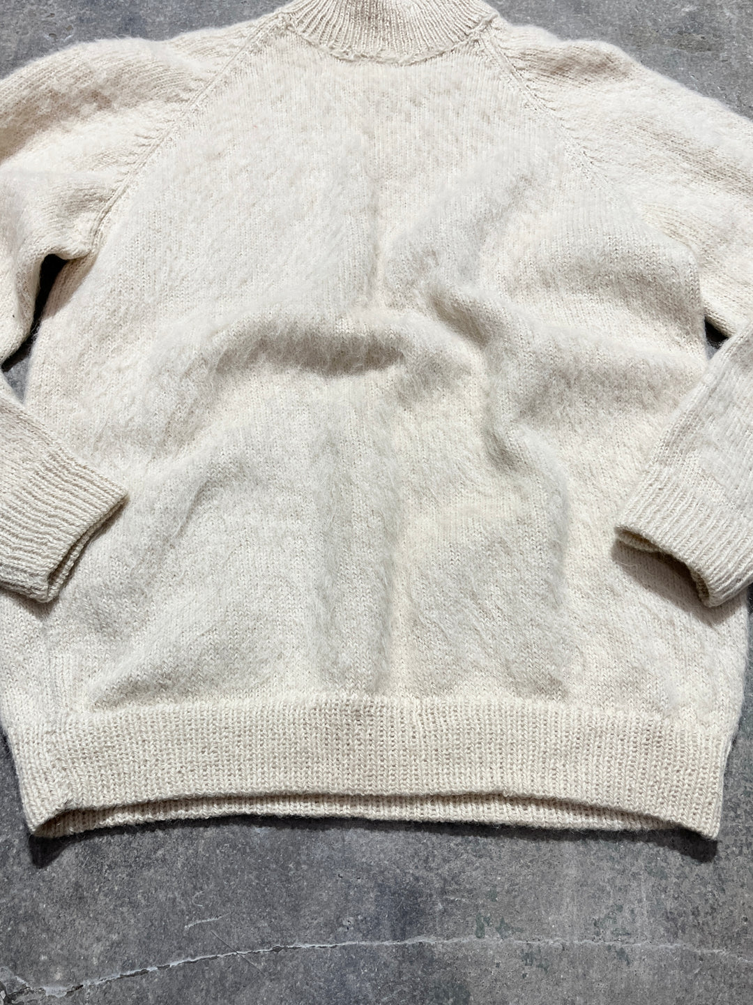 white mock neck shaggy knit