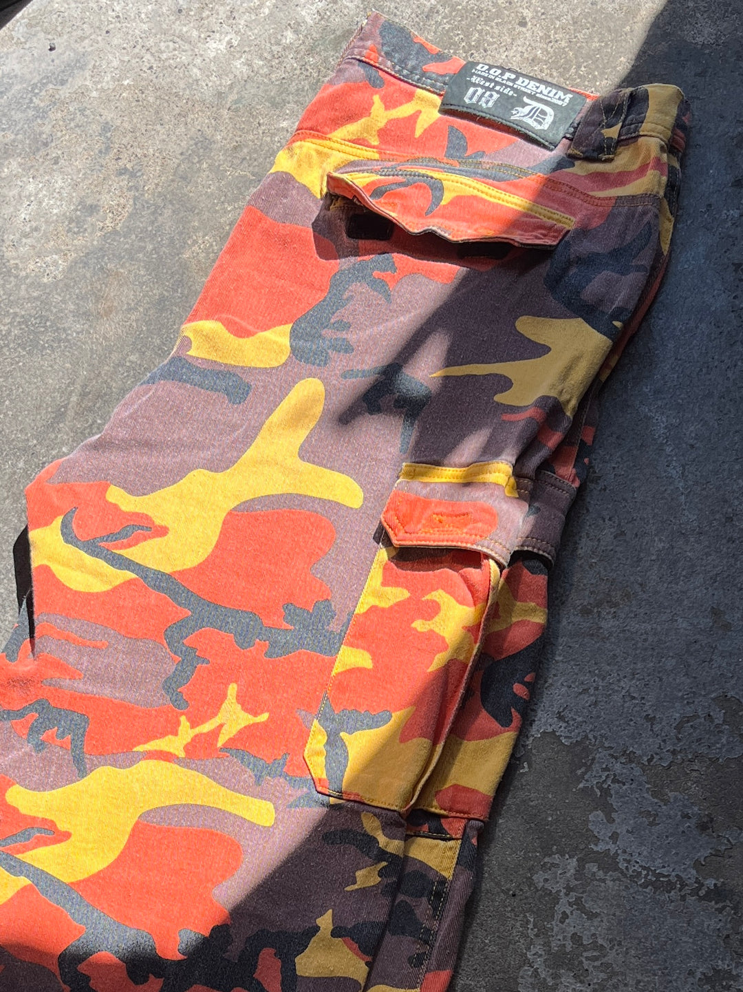 2000s "DAWN OF PLOOF" orange camouflage cargo pants