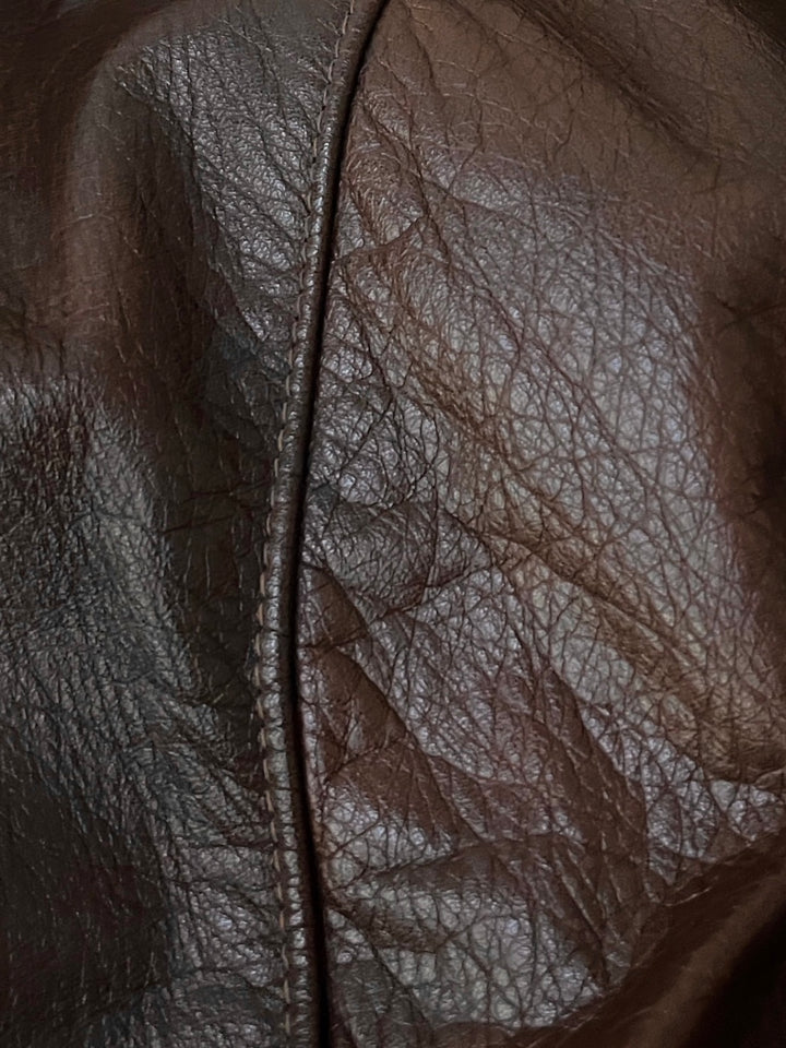 dark brown cowhide leather coat