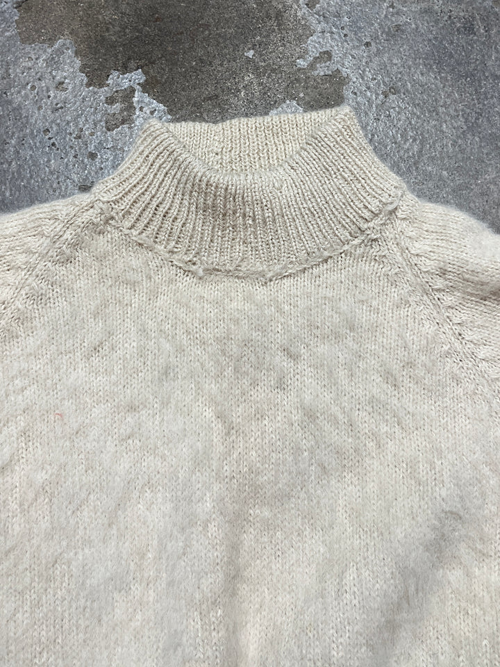 white mock neck shaggy knit