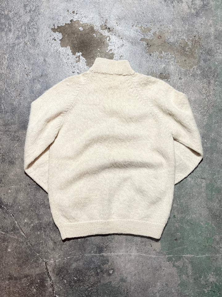 white mock neck shaggy knit