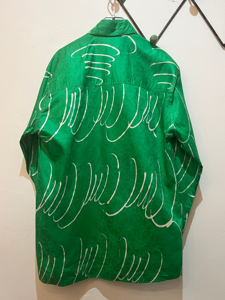 green drawing pattern shirt