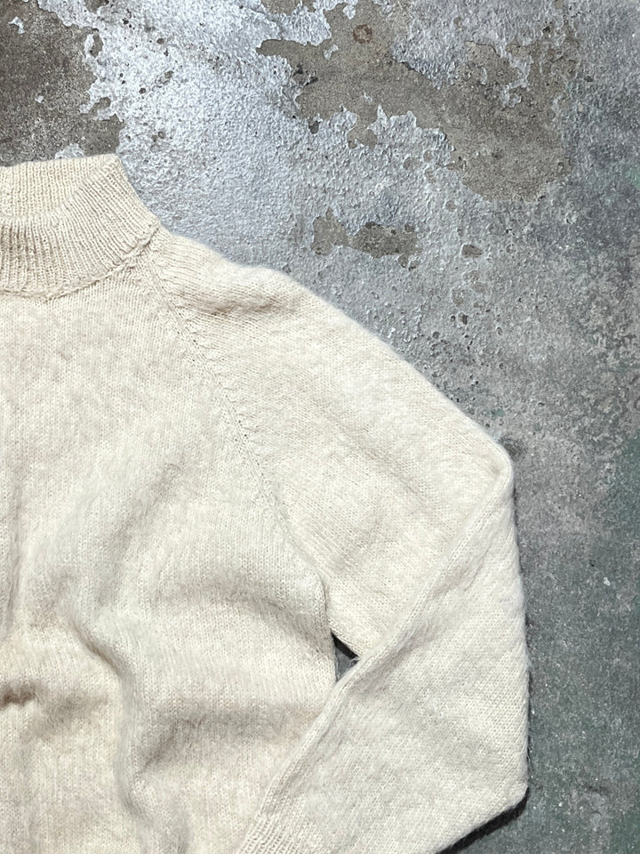 white mock neck shaggy knit