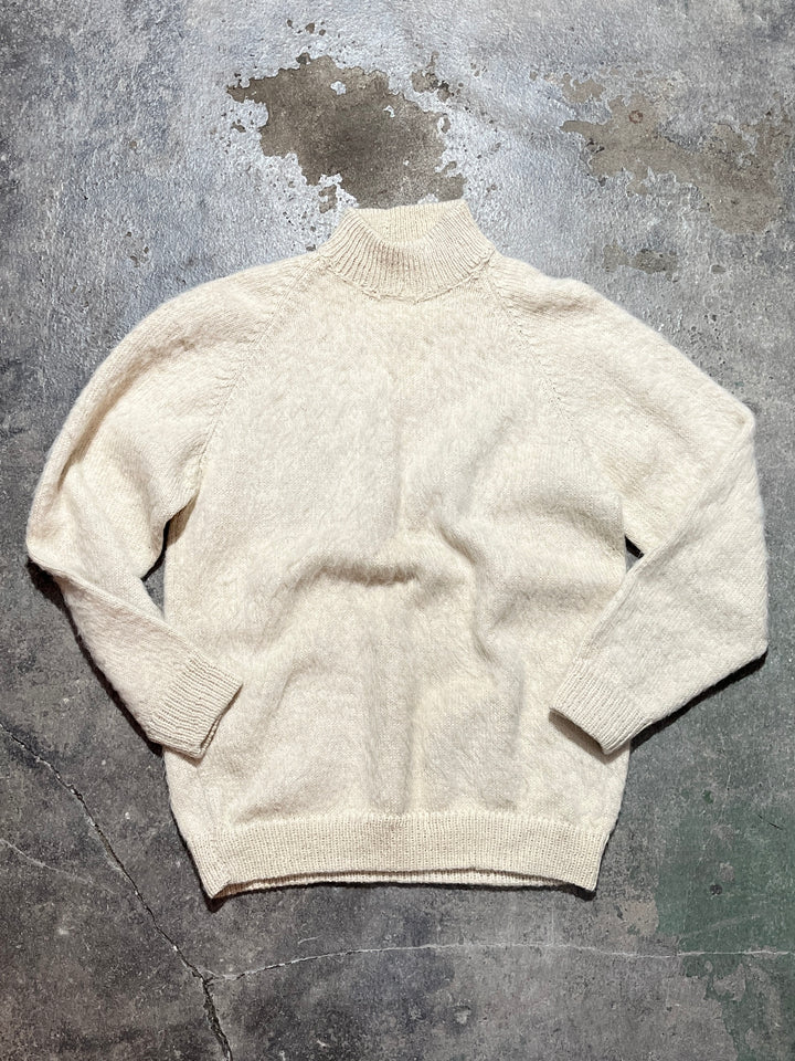 white mock neck shaggy knit