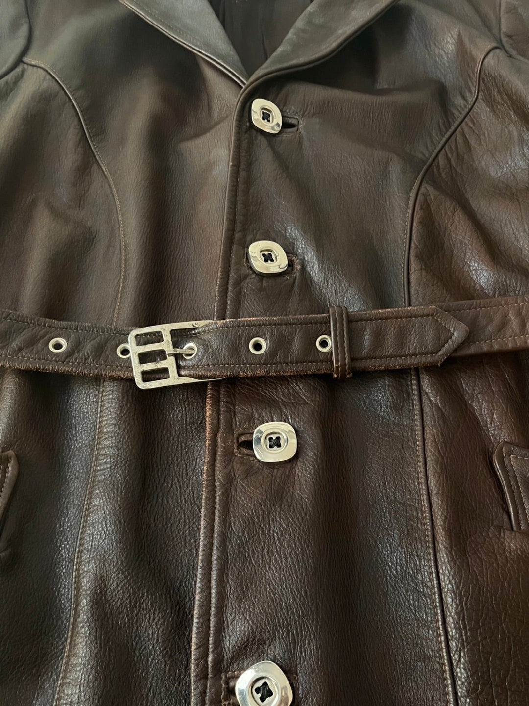 dark brown cowhide leather coat